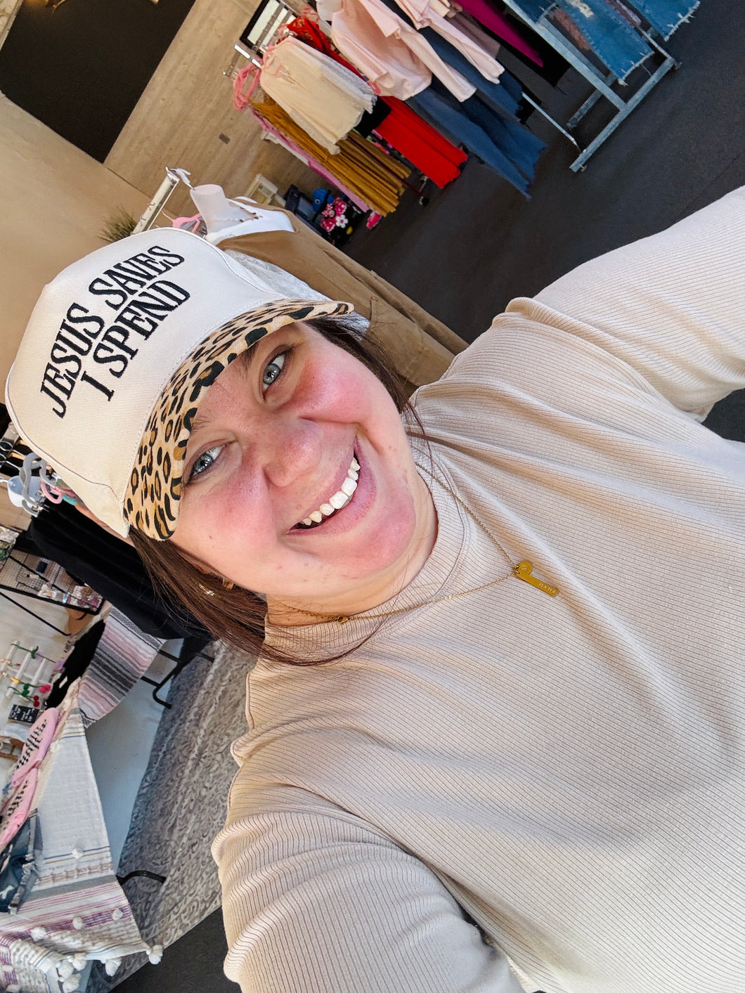 Jesus Saves I Spend Trucker Hat